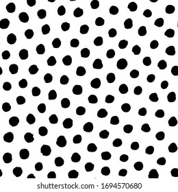 Polka dot background, Irregular hand drawn seamless pattern. Black and white vector illustration