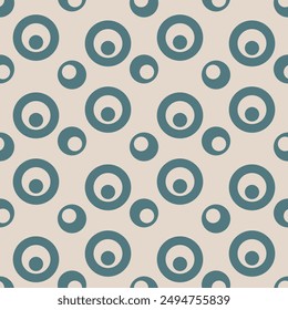 A polka dot background made of circles with circles inside them. A simple two-color polka dot pattern.