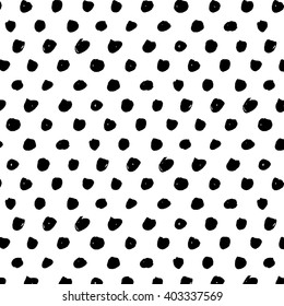 Polka dot brush stroke seamless pattern. Abstract background with round brush strokes. Monochrome hand drawn texture. Stylish polka dot. Vector illustration.