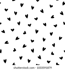 Polka dot doodle hearts seamless pattern. Valentine's day background.