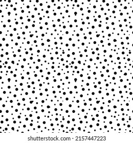 Polka dot fabric. An infinite number of black dots on a white background. Seamless pattern for textile, decorative paper. Vector.