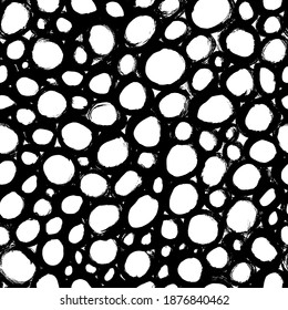 Polka dot grunge seamless vector pattern. Perforated holes and circle brushstrokes. Hand drawn abstract ink background. Smears, circles, dots, splotches, blobs. Abstract wallpaper and textile print