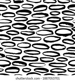 Polka dot grunge seamless vector pattern. Oval brushstrokes and rounded shapes. Hand drawn abstract ink background. Smears, ellipses, outlines splotches. Abstract wallpaper design, textile print