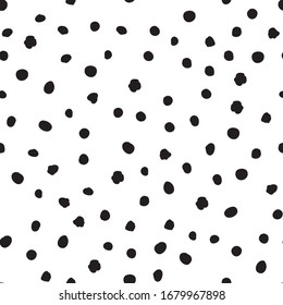 Polka dot hand drawn seamless background. Polkadot snowflakr black irregular point motif.