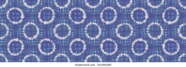 Polka dot ring tie dye seamless border pattern. Hand dyed effect wax batik circle. Spliced streaks of gradient dye gingham check background. Bleach resist blended texture geo effect ribbon trim edge
