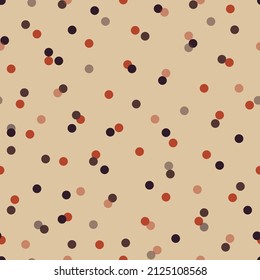 Polka dot seamless pattern. Abstract random flying colorful confetti. Trendy print in warm colors for fabric, textile, gift wrapping paper, wallpaper. Vector illustration