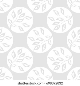 Polka dot seamless pattern. Branch with leaves in a circle. Textile rapport.