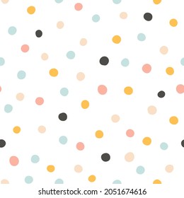 Polka dot seamless pattern. Cute Confetti. Abstractly arranged hand-drawn circles. Minimalistic Scandinavian style in pastel colors. Ideal for printing baby clothes, textiles, fabrics, wrapping paper
