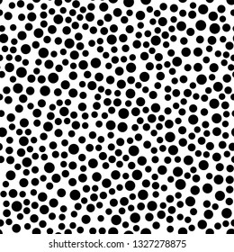 Polka dot seamless pattern in flat simple style. Vector spot texture with black points isolated on white background.