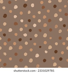 Polka dot seamless pattern with irregular circles in beige and brown shades. Naive drawing