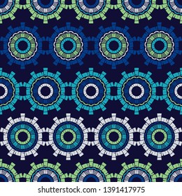 Polka dot seamless pattern. Mosaic of ethnic figures. Patterned texture. Geometric background. Can be used for wallpaper, textile, invitation card, wrapping, web page background.