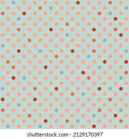 Polka dot seamless pattern on blue background. Gray vector childish background with pink, red and blue polka dots  for fabric, textile or scrapbook paper.