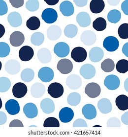 Polka dot seamless pattern in shades of blue.