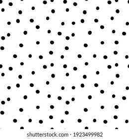 Polka dot seamless vector pattern. Repeatable  background with black dots on white.