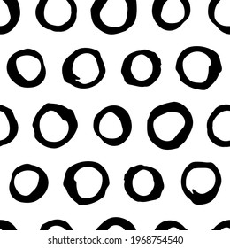 Polka dot seamless vector pattern. Trendy black and white pattern for wallpaper, textile and prints. Contemporary abstract vector illustration. Modern vector backdrop in grunge style