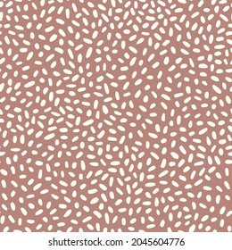 La polka puntea un patrón simple de grano de arroz en fondo marrón. Ilustración vectorial para fondo, tela, papel envolvente, impresión y web con el símbolo tradicional de riqueza y felicidad