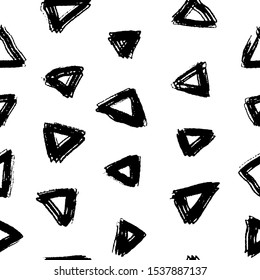 Polka dot style pattern consisting of hand drawn rough grunge triangles. Vector seamless pattern. Ink illustration perfect for wrapping paper, textile, fabric and backdrops. Black and white.