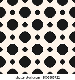 Polka dot vector monochrome seamless pattern, big and small black circles on white background. Simple abstract texture, design element for prints, cover, banner, fabric, textile, wallpaper, decor, web
