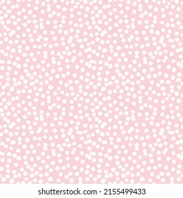 Polka dot vector seamless pattern. Irregular chaotic spots, circles. Simple abstract pink and white minimal background texture. Cute repeat design for print, cover, wallpaper, decor, textile