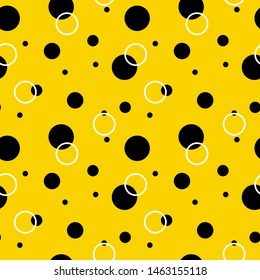 Polka dots, Circles and circles. Vector Seamless background for textile, wrapping, Wallpaper. Black and white on yellow background