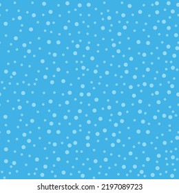 Polka dots of different sizes on a blue background