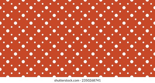 Polka dots on a red background. A simple polka with large spruce dots, and a little smaller in between.