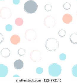 Polka dots pastel seamless pattern. Chalk brush hand drawn rounds, hoops, rings endless repeat print, abstract geometric pattern. Trending pastel ornament background. Polka dot vector illustration.