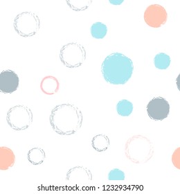 Polka dots pastel seamless pattern. Chalk brush hand drawn rounds, hoops, rings endless repeat print, abstract geometric pattern. Trending pastel ornament background. Polka dot vector illustration.