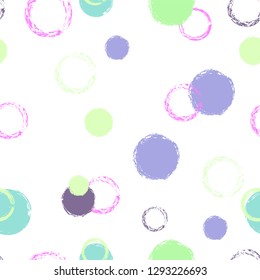 Polka dots pastel seamless pattern. Chalk brush hand drawn rounds, hoops, rings endless repeat print, circle geometric pattern. Trending pastel ornament background. Polka dot vector illustration.