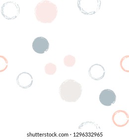 Polka dots pastel seamless pattern. Chalk brush hand drawn rounds, hoops, rings endless repeat print, abstract geometric pattern. Trending pastel ornament background. Polka dot vector illustration.