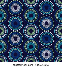 Polka dots seamless pattern. Mosaic of ethnic figures. Patterned texture. Geometric background. Can be used for wallpaper, textile, invitation card, wrapping, web page background.