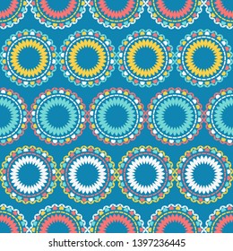 Polka dots seamless pattern. Summer flowers. Multicolored. Simple design. Vector geometric background. Can be used in printing, textile, wrapping, web-design.