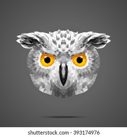 Polygon portrait of snowy owl. Low poly design. Abstract polygonal illustration.