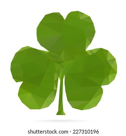 Polygonal abstract clover with three leaves (shamrock leaf), made from triangles, isolated on white