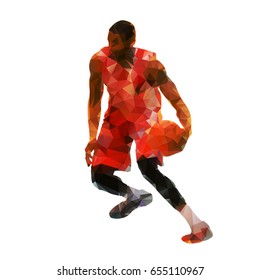 Polygonal basketball player with ball, abstract geometric vector silhouette, crossover dribbling