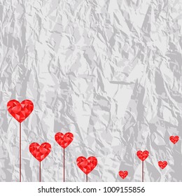 polygonal red hearts on crumpled paper background. Vector illustration