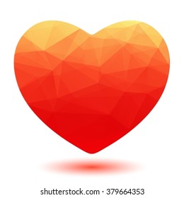 Polygonal scarlet heart isolated on a white background.