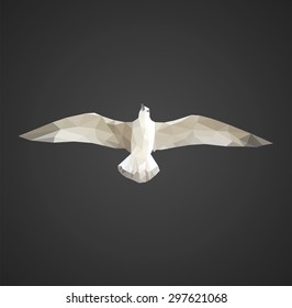 polygonal seagull in flight on a black background