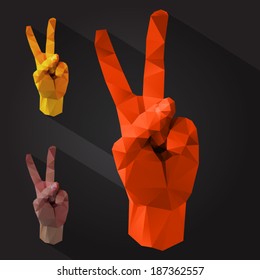 Polygonal style victory sign on a dark background