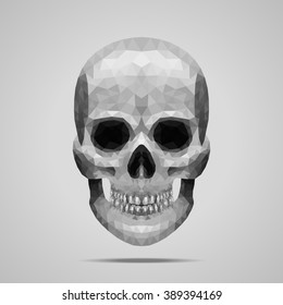 Polygonal vector gray skull. Low poly design.
