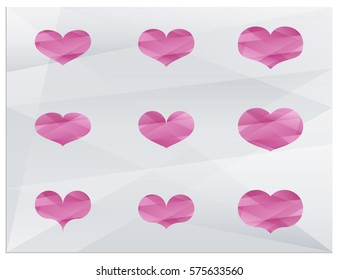 Polygonal vector hearts. A set, consisting of 9 of pink hearts, arranged on polygonal background.