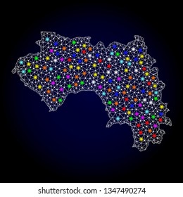 Polygonal vector map of French Guinea with glow effect on a black background. Abstract triangles, lines, light colorful spots, dots forms map of French Guinea. White mesh,