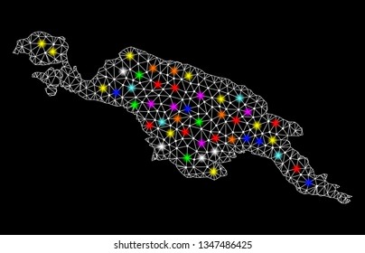 Polygonal vector map of New Guinea Island with glow effect on a black background. Abstract triangles, lines, light colorful spots, points forms map of New Guinea Island. White mesh,