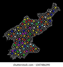 Polygonal vector map of North Korea with glow effect on a black background. Abstract triangles, lines, light colorful spots, nodes forms map of North Korea. White mesh,