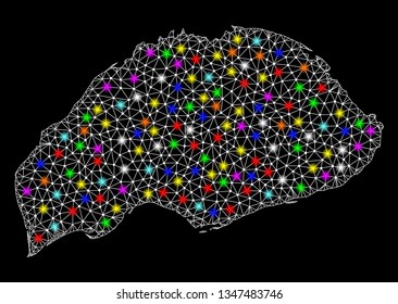 Polygonal vector map of Wrangel Island with glare effect on a black background. Abstract triangles, lines, light colorful spots, points forms map of Wrangel Island. White mesh,