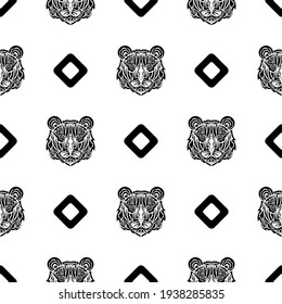 Polynesian style tiger face seamless pattern. Boho tiger face. Good for backgrounds and prints. Vector 