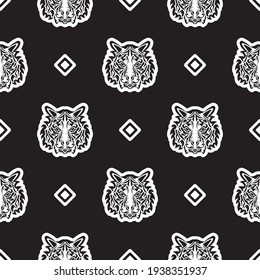 El tigre de estilo polinesio se enfrenta a un patrón ininterrumpido. Cara de tigre de Boho. Bien por antecedentes, impresiones, prendas de vestir y textiles. Vector 