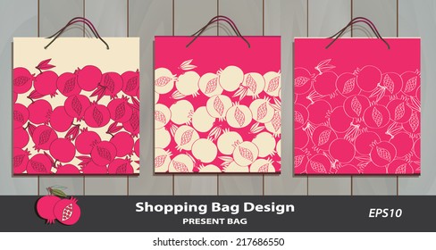 Pomegranate pattern Gift Bag set on wood texture. Identity design template. Good for present package, sales, retail, souvenirs. Pomegranate pattern is complete masked. Pomegranate icon Vector Editable