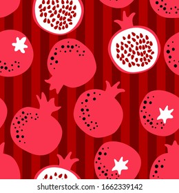 Pomegranate pattern on striped background. Repeat design for wallpaper, fabric and digital paper. Whole and half fruit drawing. Simple cute illustration in cartoon flat style.