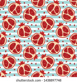 Pomegranate seamless pattern on blue stripes background. Seamless pattern with hand-drawn pomegranate.